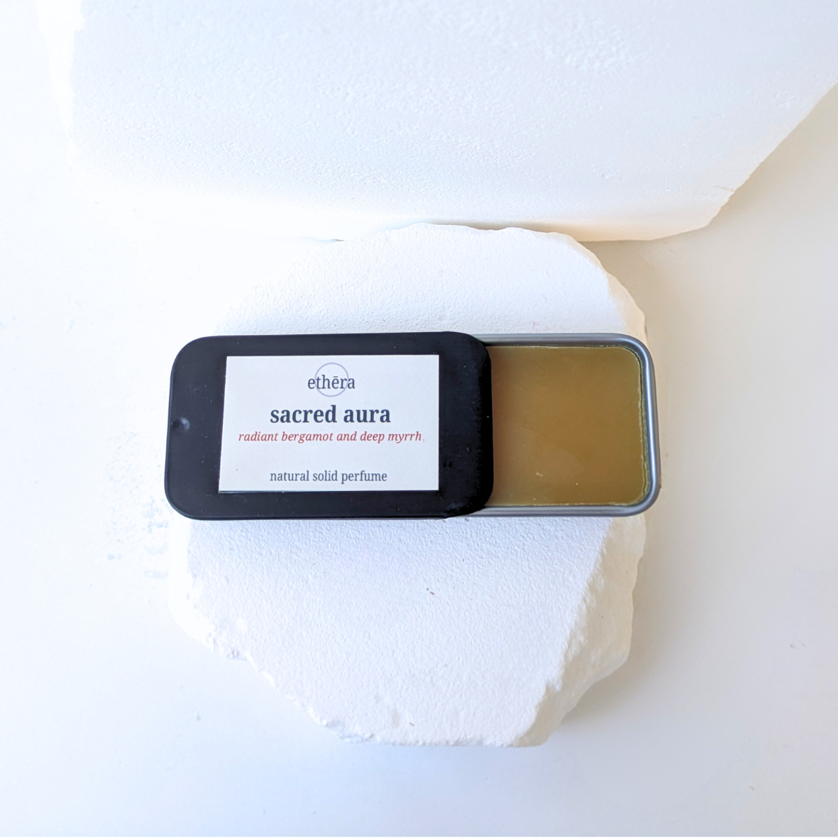 sacred aura solid perfume